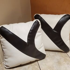 Two black and white pillows
